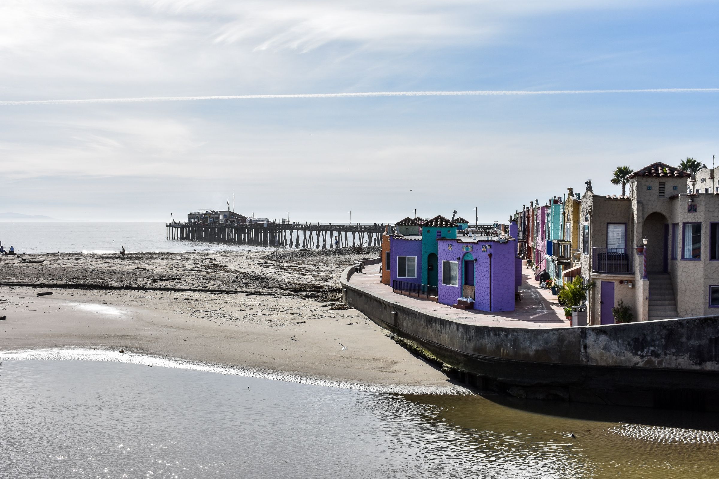 colorful beach houses right next to the beach