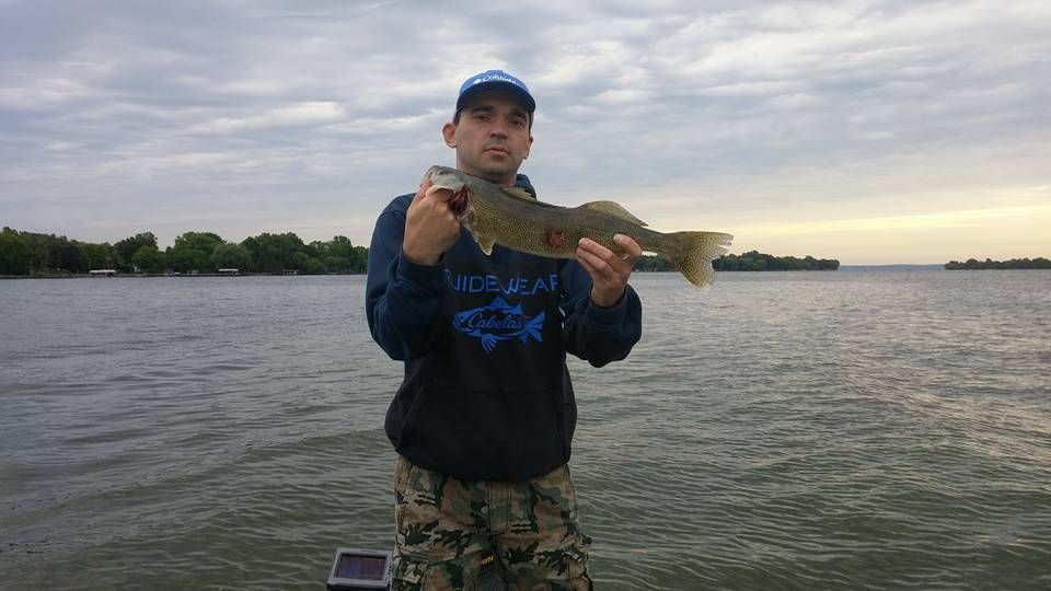 Captain Dennis Ansell with a Walleye