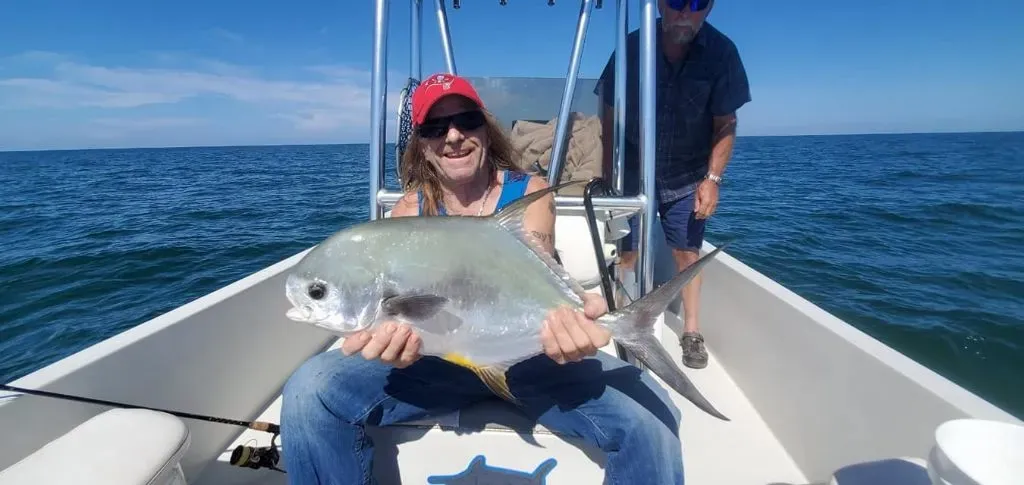 Captain Hank Valencia with a Permit
