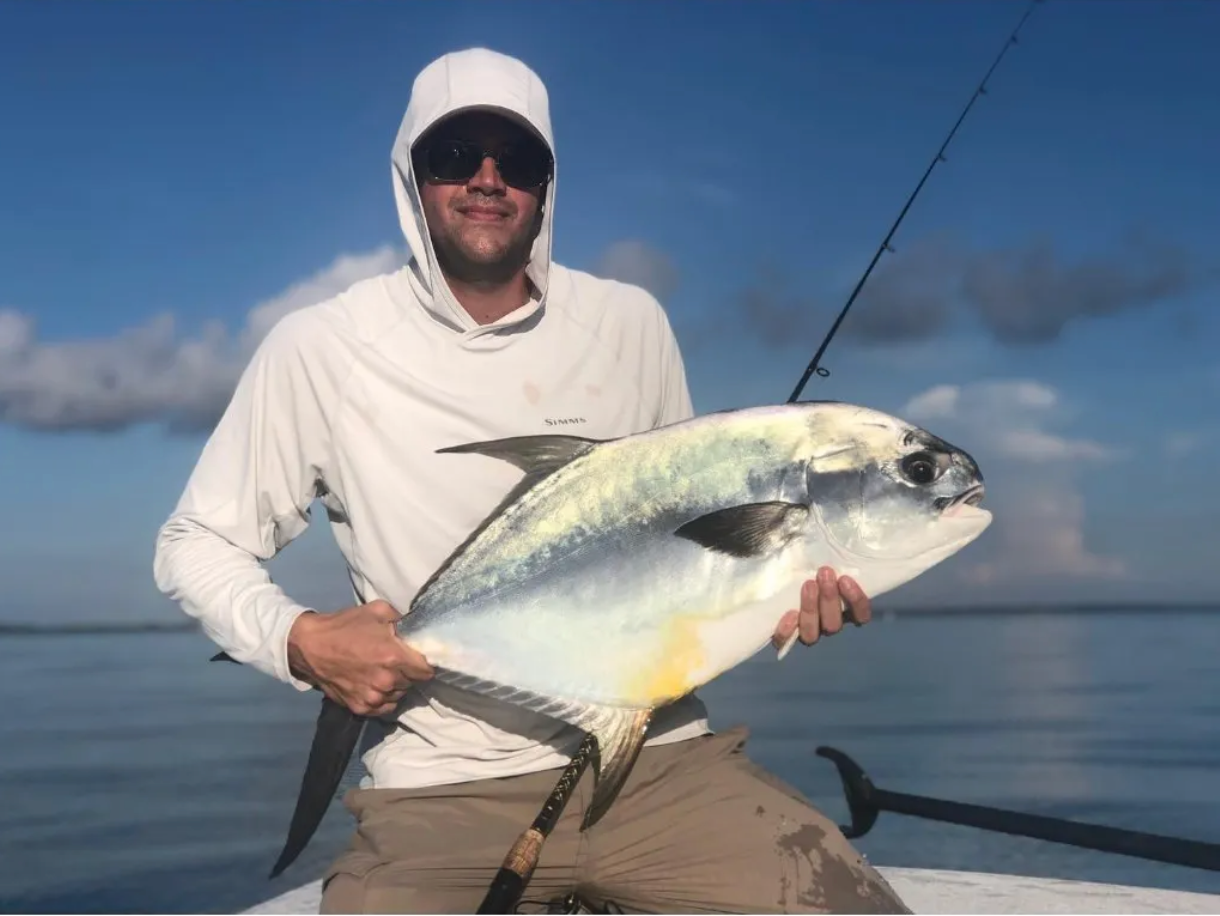 Captain Jason Fernandes with a Permit