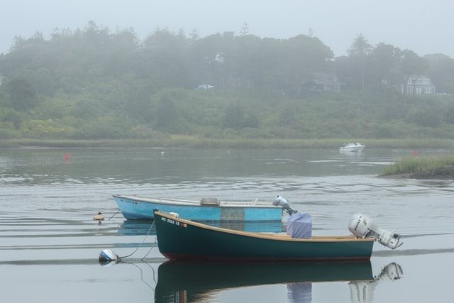 Two small boats docked on Chatham Port