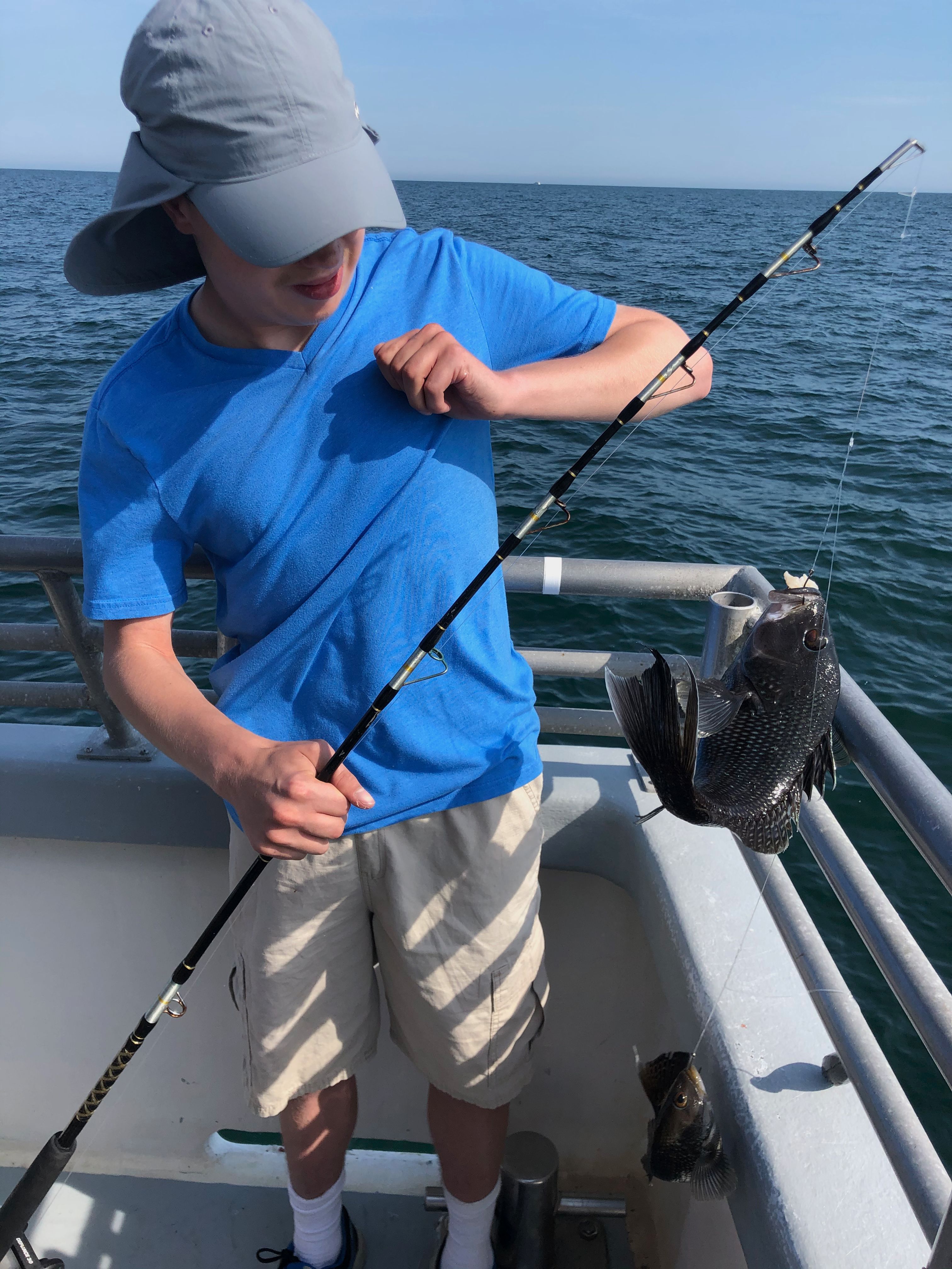 Kid catches Black Sea Bass_Cape Cod_July 2020