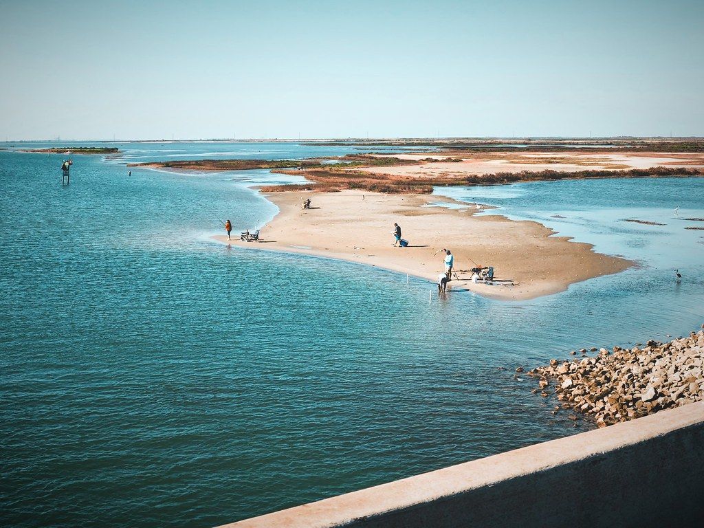 Fishing in the coastal inlet of Mustang Island