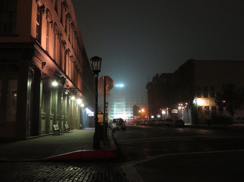 "Cold, Foggy, and Empty Night, The Strand Historic District, Galveston, Texas" by Ken Lund is licensed under CC BY-SA 2.0