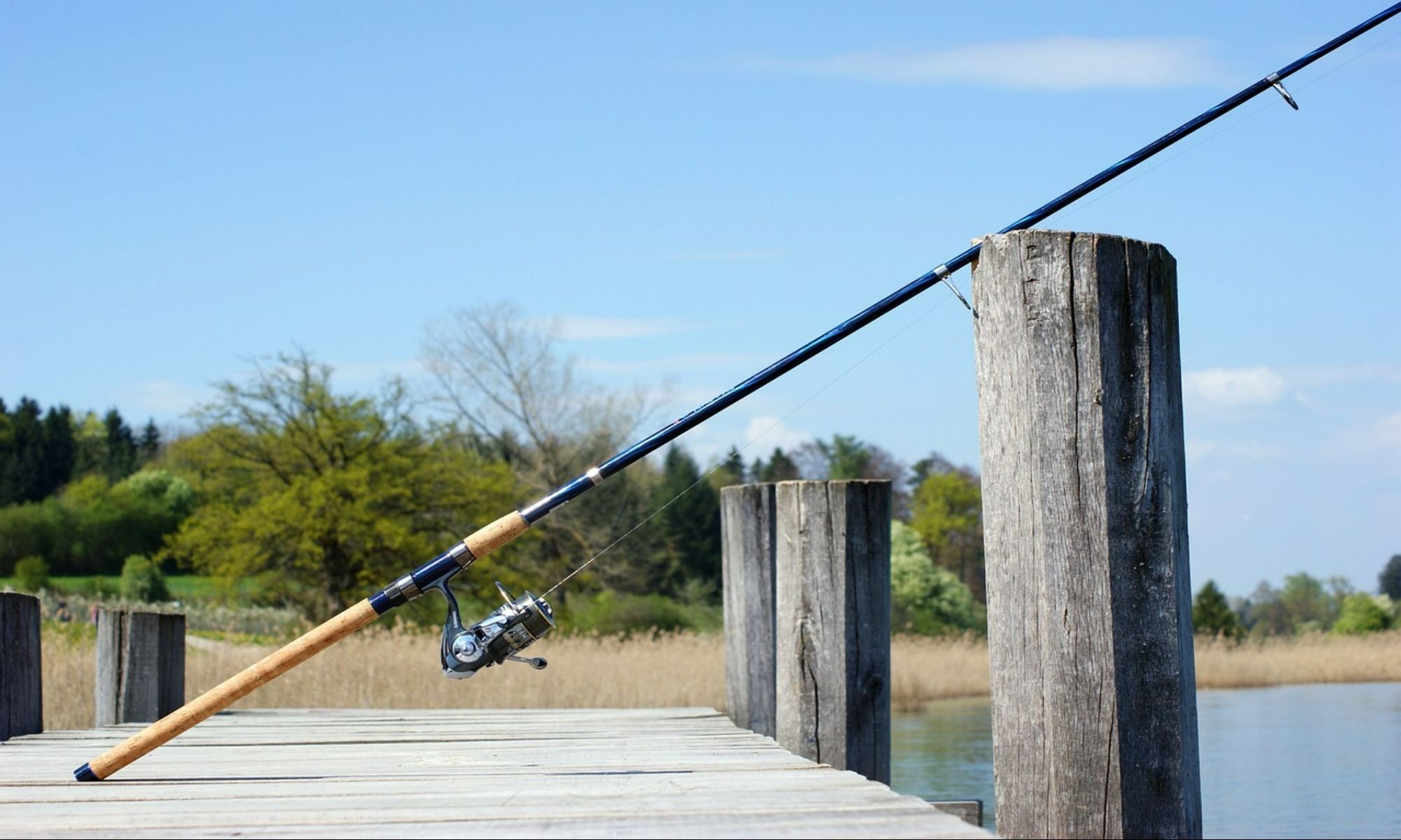 fishing rod on boardwalk